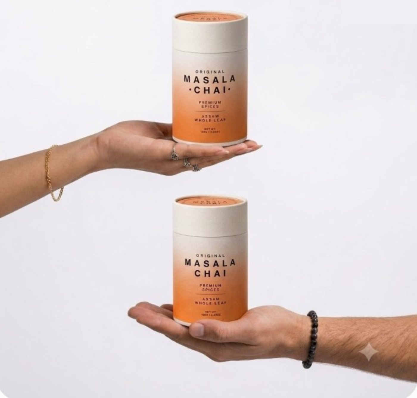 Hands holding a cup of chai